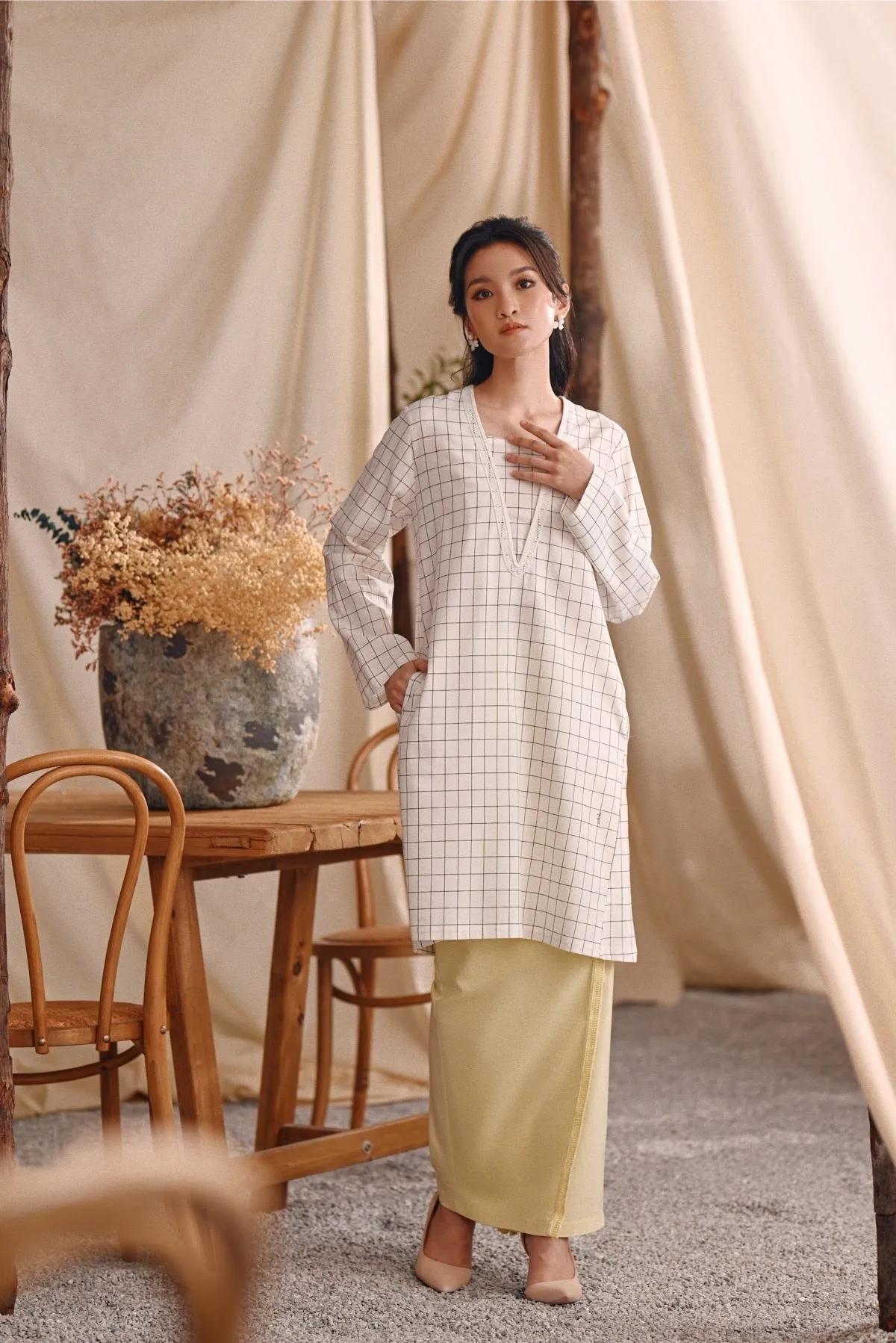 The Bayu Women Back Pleats Skirt - Baby Yellow